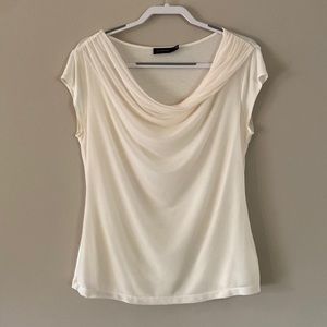 The Limited cream chiffon layer in the front cowl neck